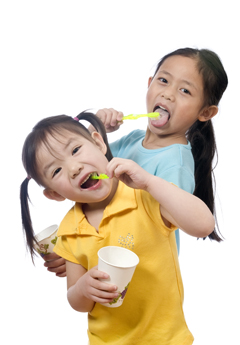 asian girls brusing teeth
